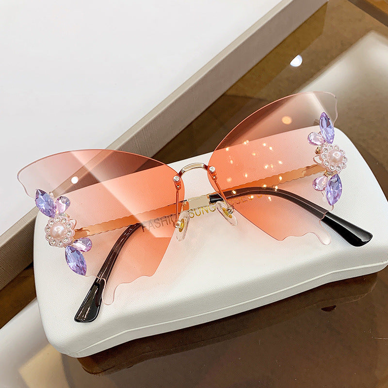 Butterfly-Shaped Diamond-Encrusted Sunglasses for a Glamorous Look