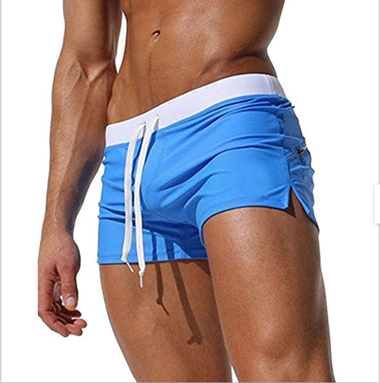 กางเกงว่ายน้ำออกแบบกระเป๋าหลังแฟชั่นสีทึบของผู้ชาย
